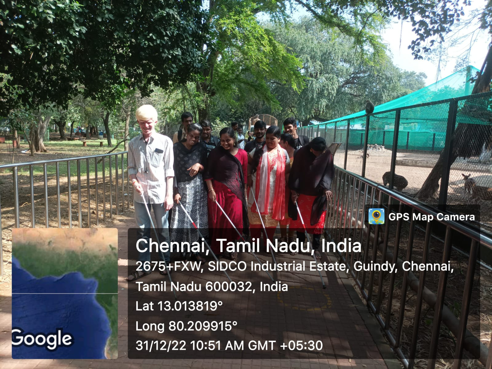 Participants seen walking along the pathway in Guindy park. Deers are too seen in the picture