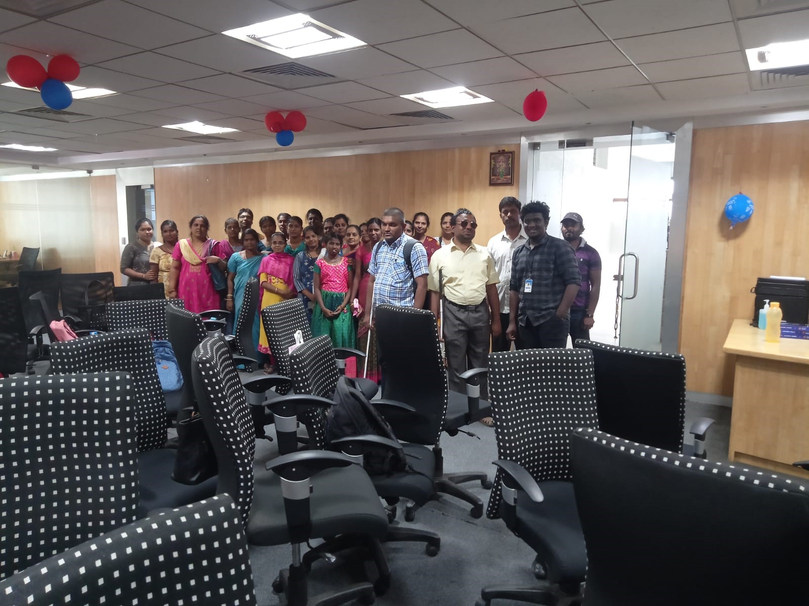 Students and parents along with Karna Vidya Foundation staff members in the meeting room