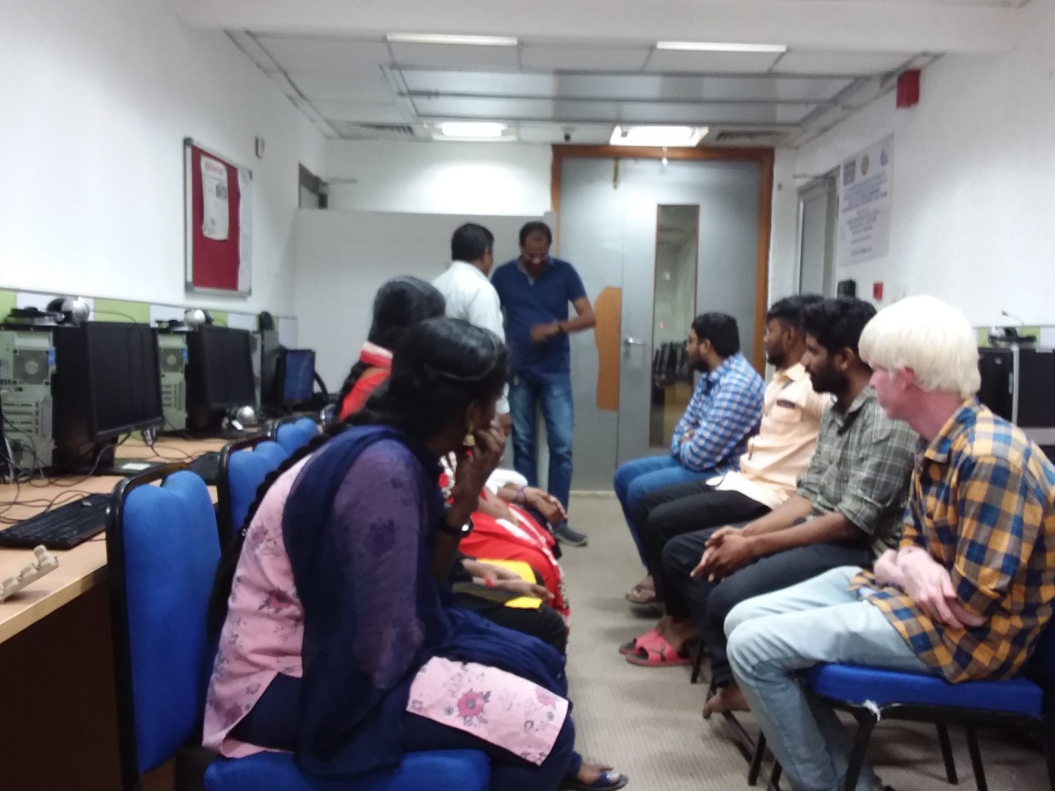 Beneficiaries seeking placement listening to the recruiter 